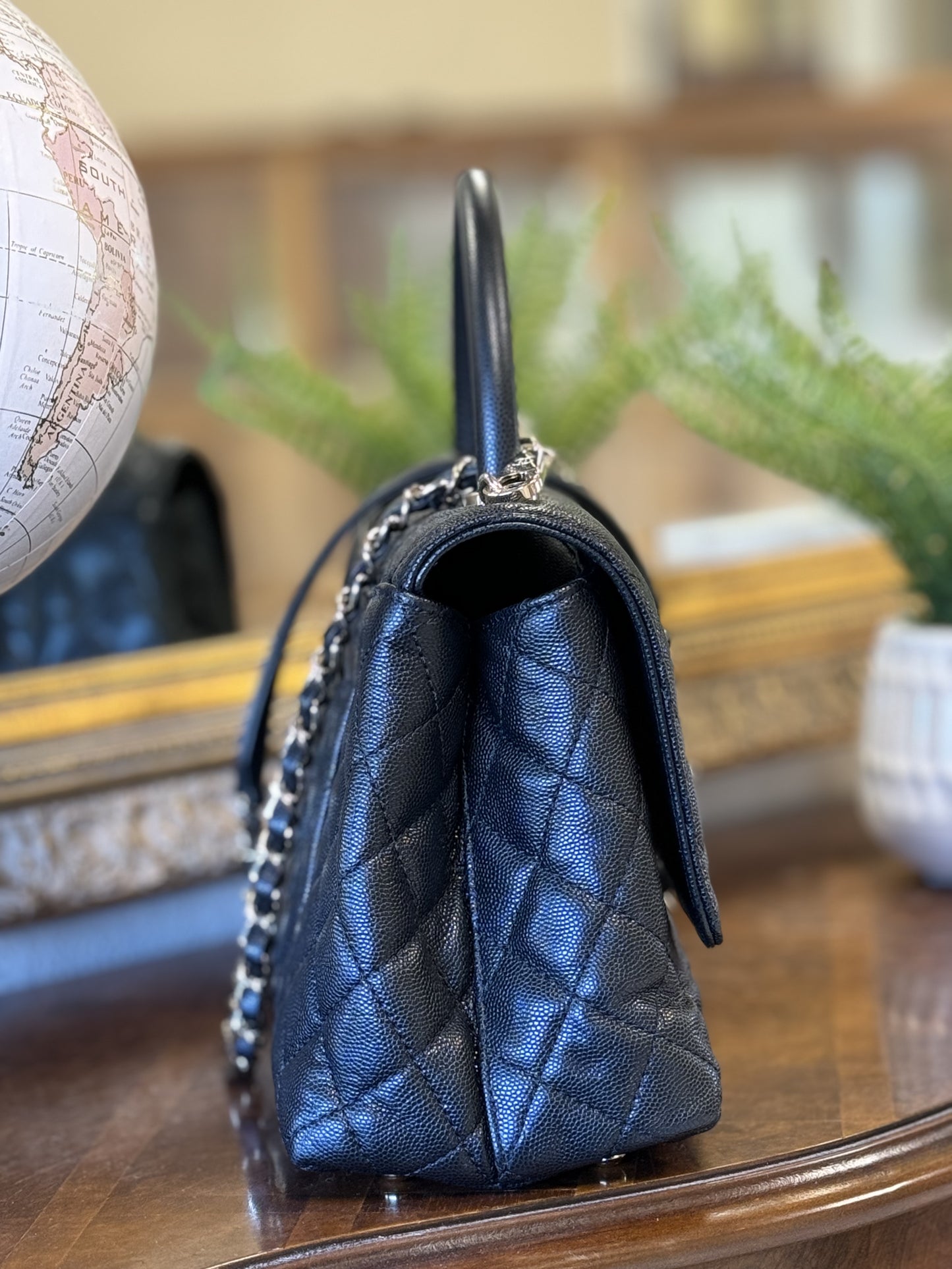 CHANEL 
Caviar Quilted Medium Coco Handle Flap Black